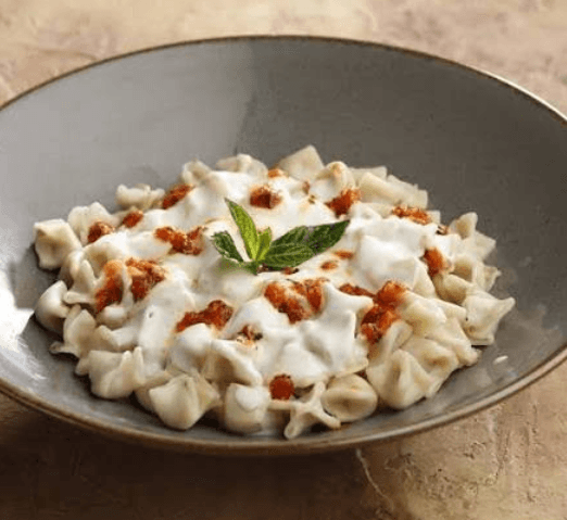 Turkish ravioli manti with yogurt